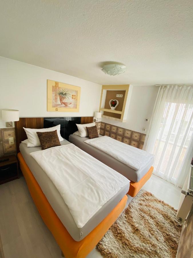 T&K Appartements บาดฮอมบูร์ก ฟอร์ แดร์เฮอเฮอ ภายนอก รูปภาพ